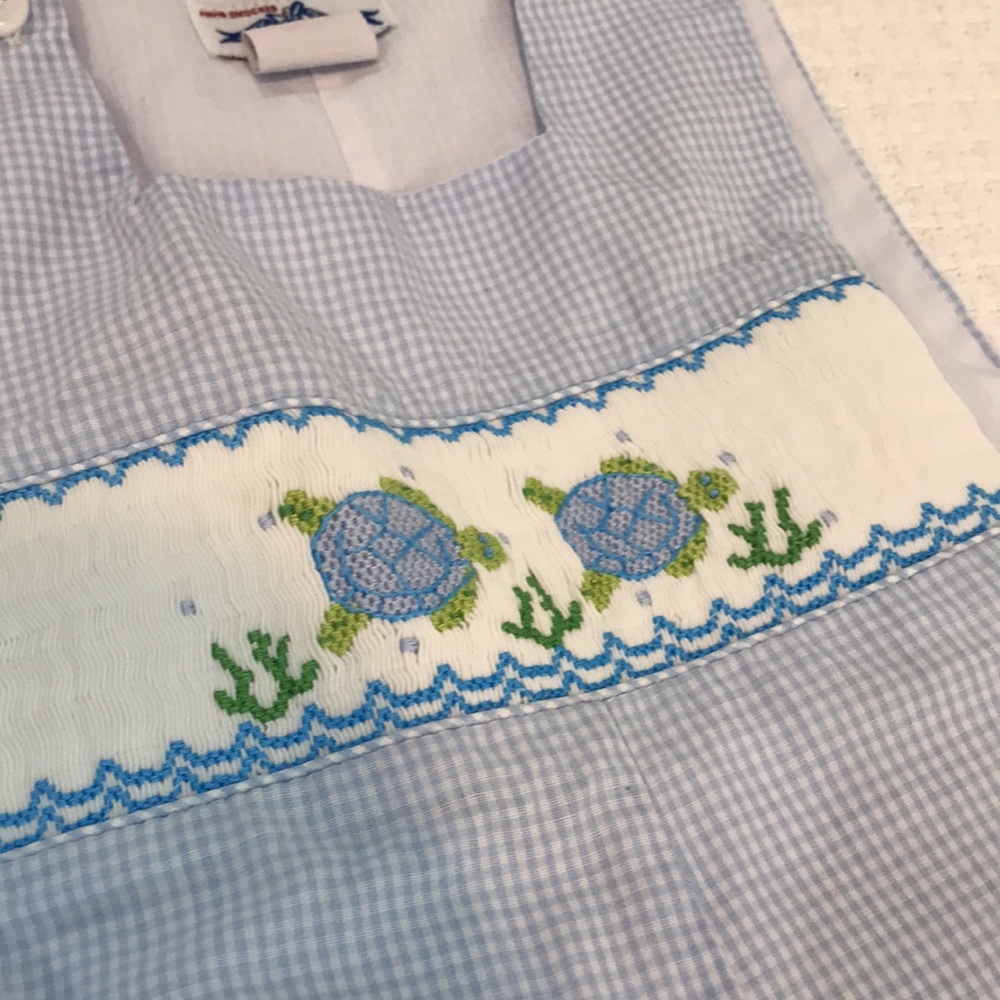 Turtle smocked shortall.